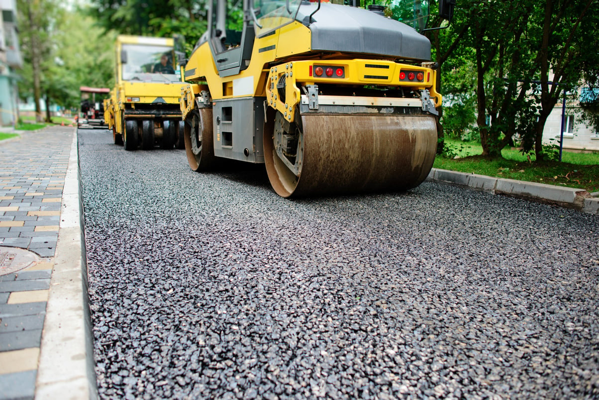 Background of asphalt roller that stack and press hot asphalt. Road repair machine